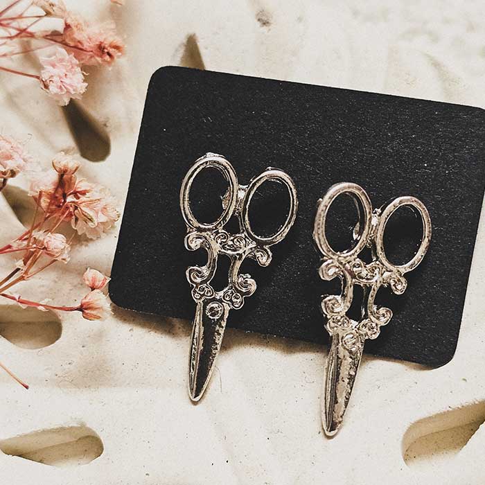 Aretes tijeras